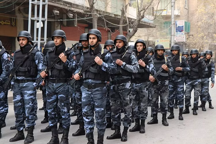 Hình ảnh lực lượng an ninh Syria bảo vệ thành phố Aleppo tham gia lễ diễu binh hôm 21/12. Nguồn ảnh: SANA.