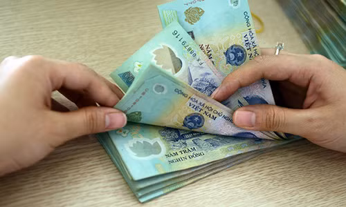 Cong an Ha Noi dieu tra nghi van chay an tien ty