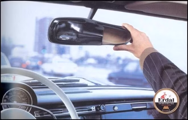 Quảng cáo xi đánh giày Erdal Shoe Polish giúp giày của bạn bóng lộn chẳng kém gì gương xe.