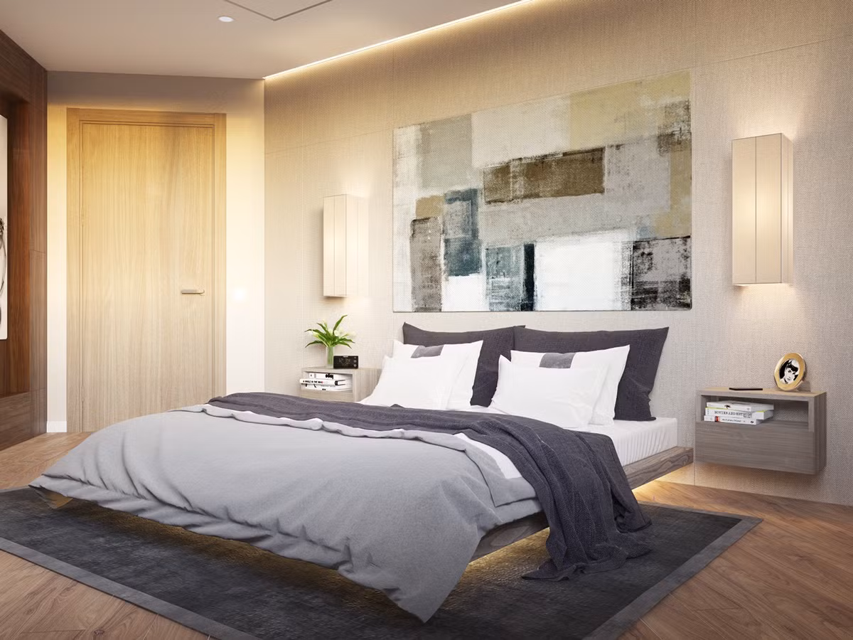 Hiệu ứng ánh sáng từ hai chiếc đèn gắn tường giúp phòng ngủ trông khá lung linh.