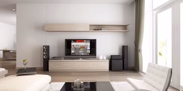 Khu vực giải trí trong phòng ngủ sang trọng với tông trắng làm chủ đạo.