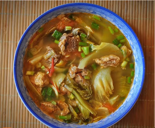 Sườn hầm dưa chua thơm ngon hấp dẫn cũng là món ăn ngon số 1 để giải ngán ngày Tết. Nguồn ảnh: Món ngon mỗi ngày, pasgo.
