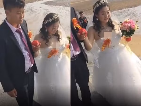 Vì ham diện váy cúp ngực khoe vòng 1 “khổng lồ” đã khiến cho cô dâu gặp sự cố kém duyên ở một vài góc máy.