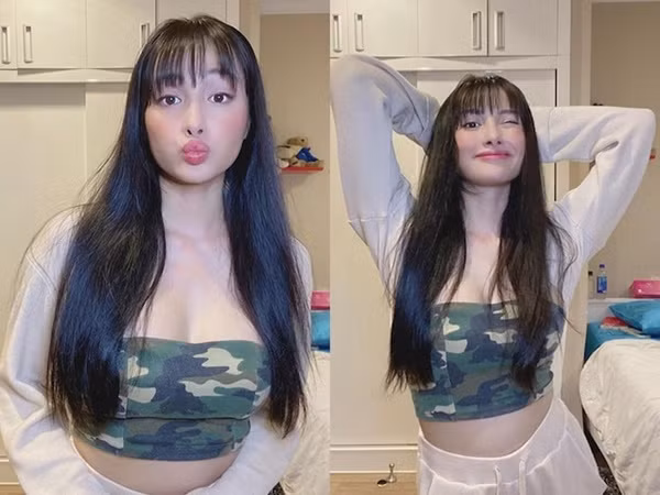 Yaya Trương Nhi mặc set đồ thể thao kết hợp áo quây họa tiết quân đội để khoe khéo vòng một căng đầy cùng vòng eo gợi cảm.