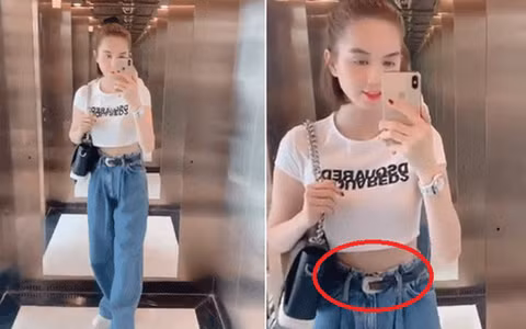 "Nghiện" quần bò nhưng người mẫu Ngọc Trinh lại hiếm khi mặc đẹp vì eo quá bé nên cô phải dùng thắt lưng đến nhăn nhúm cả quần.