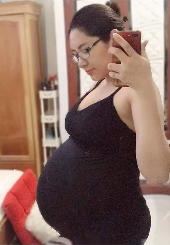 Dang Thu Thao khoe bung bau 6 thang, ran da giong trai dua luoi