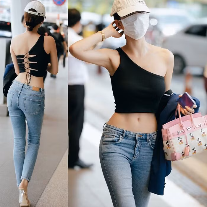 Chiếc túi Mickey Mouse này hiện đang rất được lòng Ngọc Trinh thời gian này. Xem video "Ngọc Trinh lại phát ngôn sốc về đàn ông". Nguồn VTC: