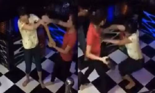 Phat hoang man danh ghen tap the trong quan karaoke-Hinh-2