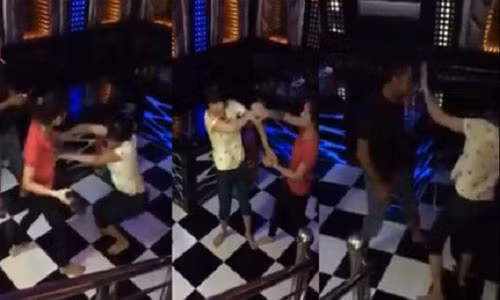 Phat hoang man danh ghen tap the trong quan karaoke