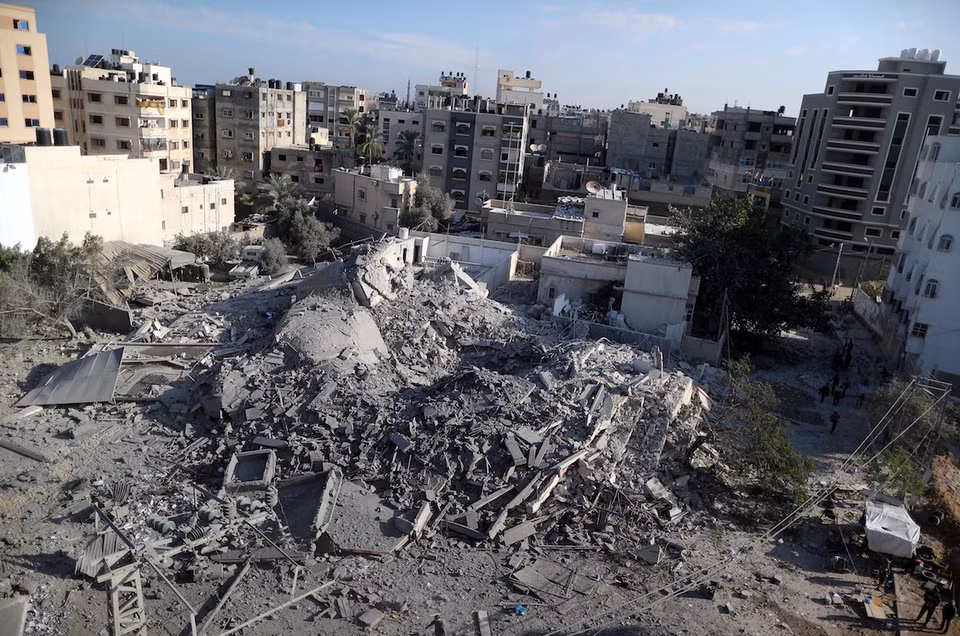 Các vụ không kích của Israel đánh trúng vào khách sạn Al-Amal, một nhà kho vũ khí và một trung tâm điều khiển tác chiến của Hamas. Nguồn ảnh: BI.