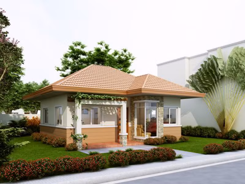 Nhà cấp 4 nhỏ xinh tọa lạc giữa khu vườn xanh mướt nhiều cỏ cây hoa lá. Các chi tiết phào chỉ trang trí ấn tượng góp phần làm tăng tính thẩm mỹ cho không gian. Ảnh: Angcovat.