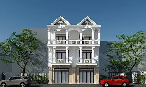 Thiết kế theo phong cách châu Á cổ điển, ngôi nhà 3 tầng nổi bật với bề mặt chạm khắc sang trọng. Ảnh: Butecco.