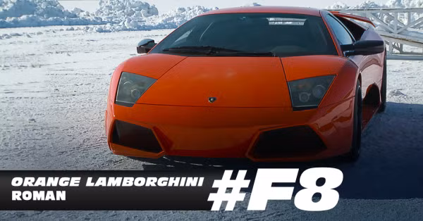 Siêu xe Lamborghini màu cam đắt đỏ thuộc sở hữu của nhân vật Roman trong phim. Ảnh: Motor Trend.