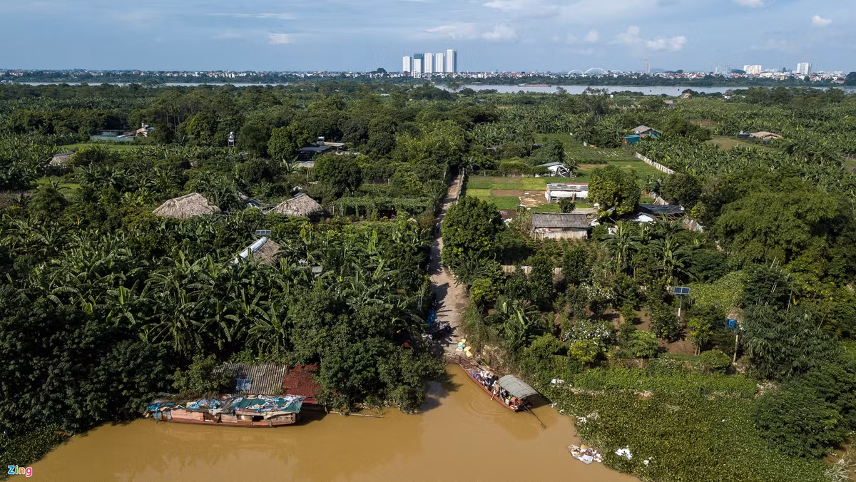 Nguoi dan Ha Noi di chuyen bang do sau tran mua ngap