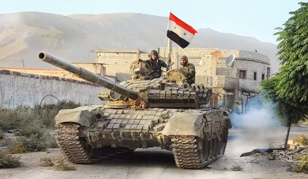 Trong diễn biến liên quan, Quân chính phủ Damascus đang củng cố các căn cứ quân sự của họ trên toàn mặt trận ở Bắc và Tây Bắc Syria để chuẩn bị cho cuộc chiến ác liệt và khó khăn sắp tới. Ảnh: FNA.