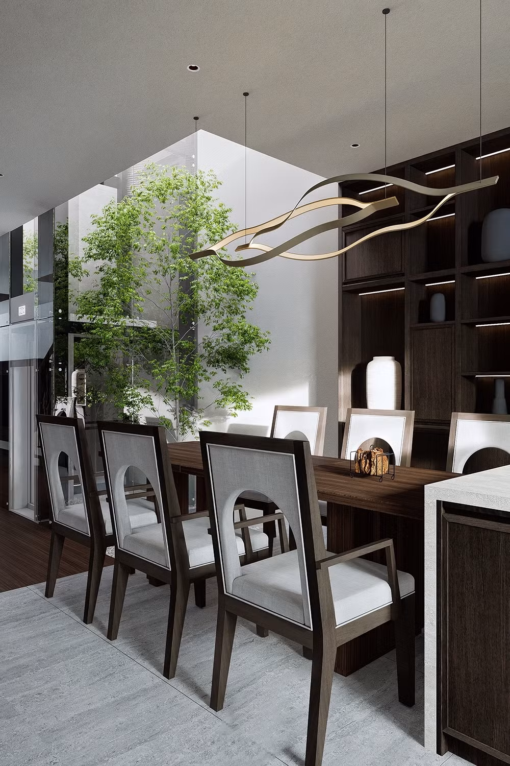 Giếng trời giúp tất cả các phòng đều có thể đón nắng và nhìn thấy view cây xanh, gần gũi thiên nhiên.
