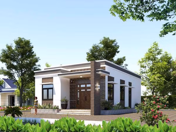 Sử dụng các khối màu nhã nhặn, ngôi nhà cấp 4 mái bằng đáp ứng được nhu cầu của gia chủ khó tính nhất, bởi chi phí xây dựng không quá cao nhưng vẫn đủ. Ảnh: Internet