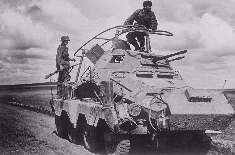 Trong quá trình phục vụ tại LSSAH, Wittmann đã bộc lộ tài năng thiên bẩm về khả năng chỉ huy các phương tiện bọc thép của mình và bản thân ông cũng có niềm đam mê to lớn dành cho loại vũ khí này và một trong số đó chính là xe tăng. Tuy nhiên do thiếu kinh nghiệm chiến đấu, Wittmann chỉ được giao chỉ huy một chiếc Sd.Kfz.232 và đây cũng là phương tiện bọc thép của đầu tiên của Wittmann. Nguồn ảnh: World War Photos.