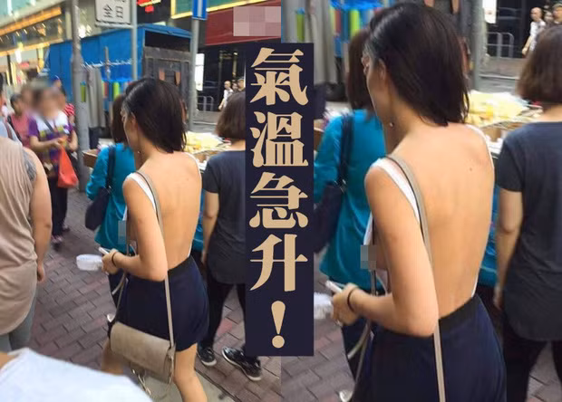 Bỏ qua mọi ánh mắt nhòm ngó, cô gái trên vẫn tự tin khoe mảng lưng trần giữa phố thị đông người.