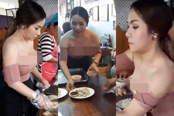 Diện áo bẹt vai đã thế còn khoe hơn nửa phần ngực, cô gái trẻ người Thái đứng bán cơm gà từng nhận không ít gạch đá từ phía dư luận xung quanh. Ảnh Internet
