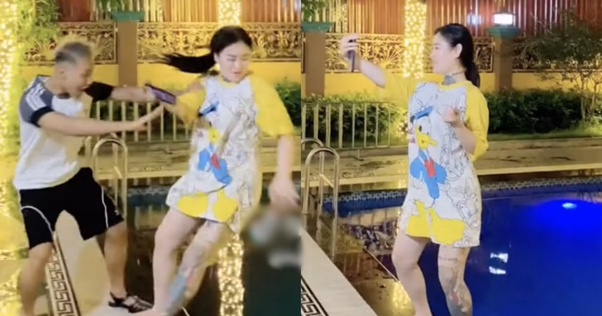 Sau 1 lúc đứng cười khoái chí, cô gái này mới được thanh niên này đưa gậy kéo lên. Hành động trên lại một lần nữa khiến dân tình không khỏi bức xúc.