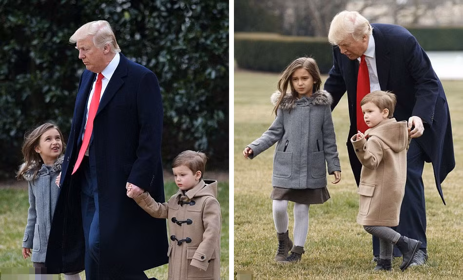 Ngắm hai cháu ngoại xinh như thiên thần của Tổng thống Mỹ Donald Trump trong lúc được ông dắt lên trực thăng ở bãi cỏ phía nam của Nhà Trắng. Ảnh Daily Mail