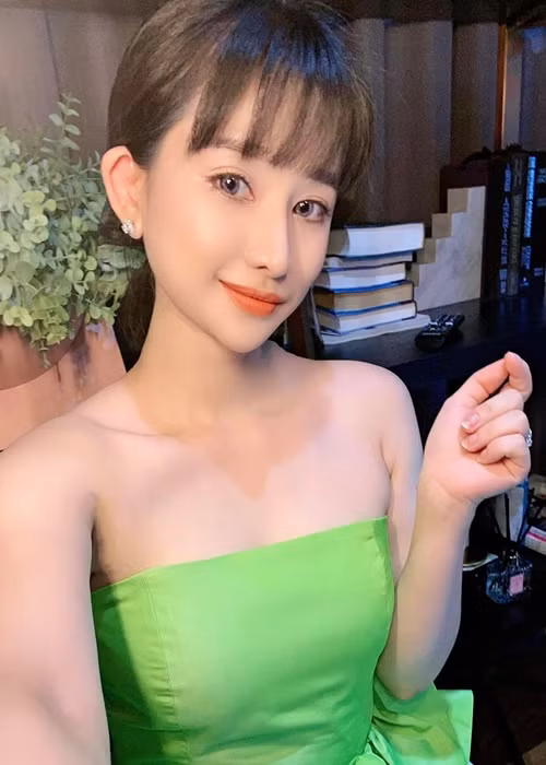Người đẹp phủ nhận tin đồn hẹn hò Quang Lê và Quốc Trường. Ảnh: FBNV