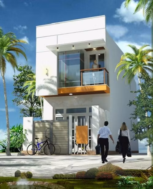 Nhà ống 2 tầng ấn tượng từ mặt tiền phẳng kết hợp ốp kính.