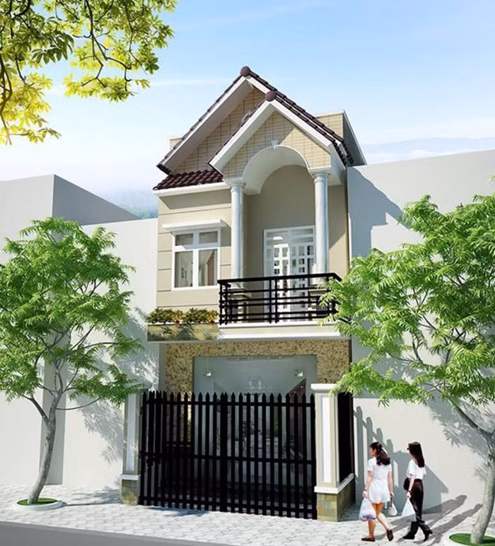 Mặt tiền ấn tượng với đá ốp sang trọng. Thêm vào đó là các đường phào chỉ kẻ ngang, trụ cột tròn được làm khá tỉ mỉ. Ảnh: Nhadep.