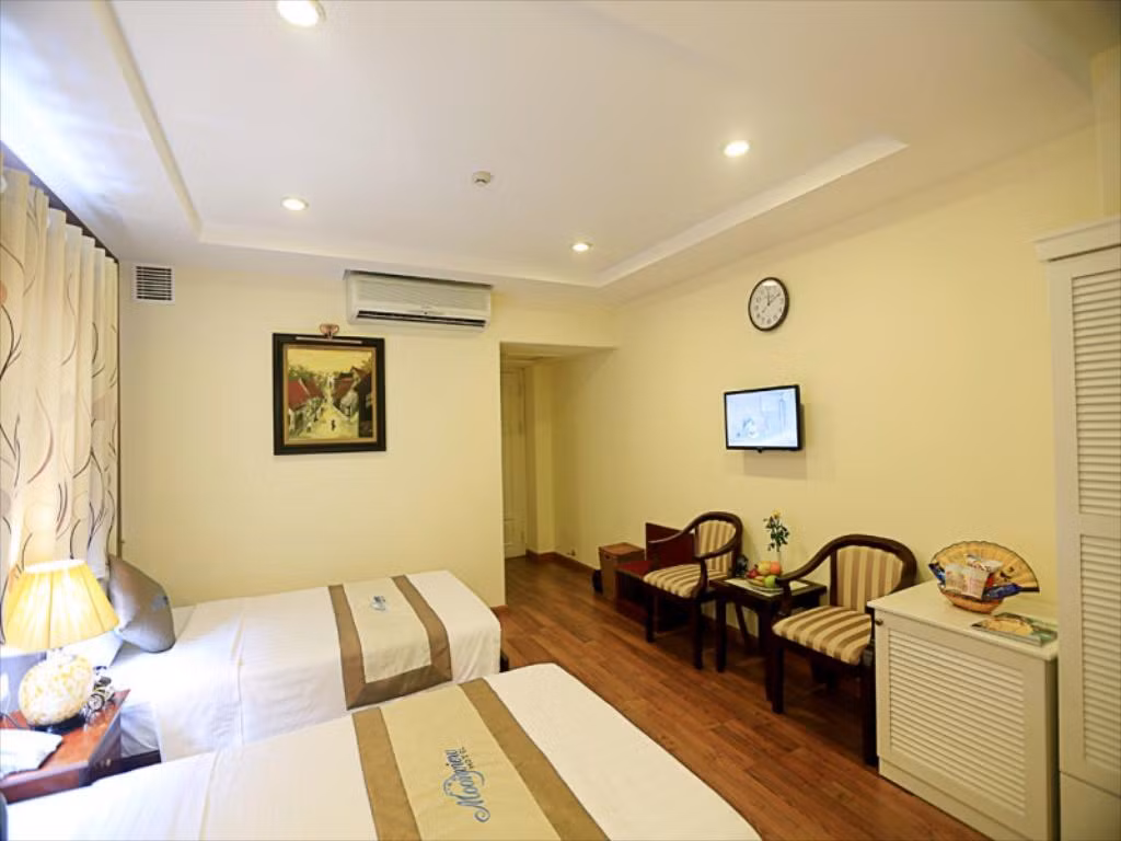 Trong phòng trang bị đầy đủ tiện nghi như điều hòa, ti vi màn hình phẳng, wifi...Ảnh: Booking.