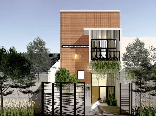 Nhà phố ấn tượng với mặt tiền ốp gạch nung. Gạch nung phù hợp với điều kiện khí hậu Việt Nam và tiết kiệm chi phí. Ảnh: Sekala.