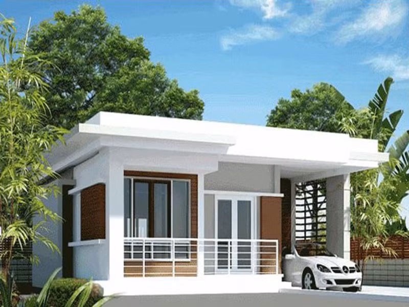 Nhà cấp 4 mái bằng diện tích 50m2 giản dị với gam màu trắng. Ảnh: Angcovat.