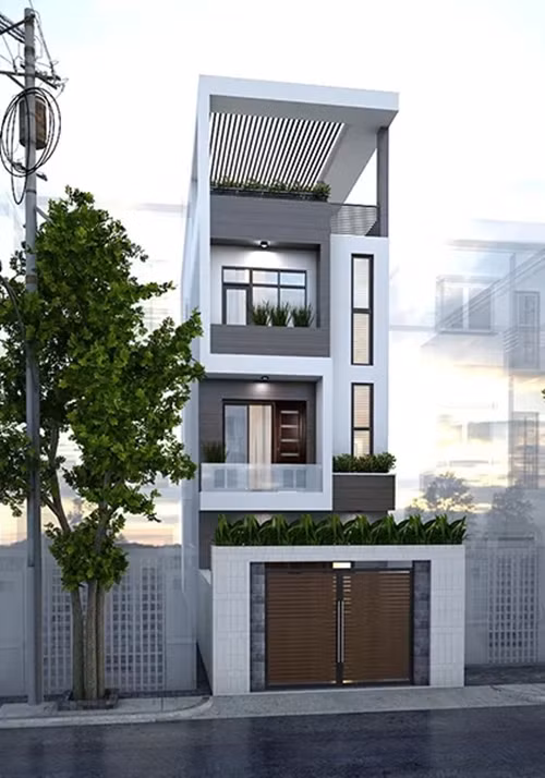 Nhà 3 tầng 1 tum sử dụng hàng rào xung quanh bằng cây xanh nhằm đưa thiên nhiên vào trong nhà. Sân thượng thoáng rộng với hệ lam đẹp mắt. Ảnh: Wedo