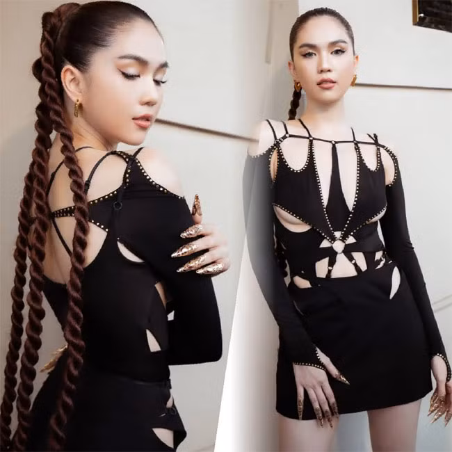 Bộ trang phục màu đen giúp người đẹp Trà Vinh gây chú ý bởi đường cut-out nơi chân ngực, khoe vòng 1 lấp ló.