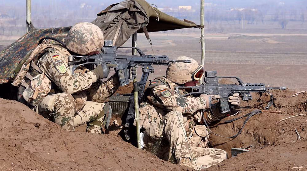 Súng trường Heckler &amp; Koch G36 của Quân đội Đức: một trong số những khẩu súng trường tấn công tốt nhất hiện nay sử dụng đạn tiêu chuẩn NATO 5,56 × 45 mm, tầm bắn hiệu quả 800m, tốc độ bắn 750 viên/phút, hộp đạn làm từ polymer trong suốt giúp xạ thủ quan sát lượng đạn còn lại. Nguồn ảnh: Wiki