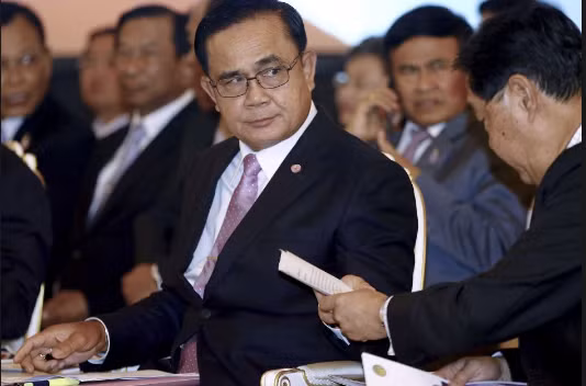 Ba tháng sau cuộc đảo chính do ông Prayut lãnh đạo hồi tháng 5/2014, Cơ quan lập pháp chính quyền quân sự Thái Lan đã quyết định bổ nhiệm Tướng Prayut Chan-o-cha làm Thủ tướng nước này. Ảnh: ABC.