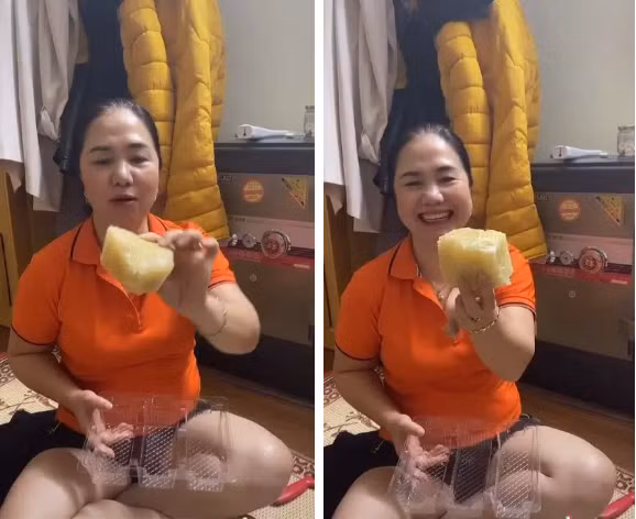 Người mẹ đi chơi về thấy cô con gái bổ bưởi như miếng bánh. Mặc dù cười thế thôi nhưng trong lòng chắc mẹ cũng lo lắng không biết con lấy nổi chồng không nữa