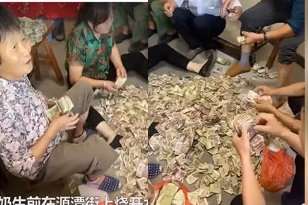 Cu ba qua doi de lai tu tien, con chau dem moi tay
