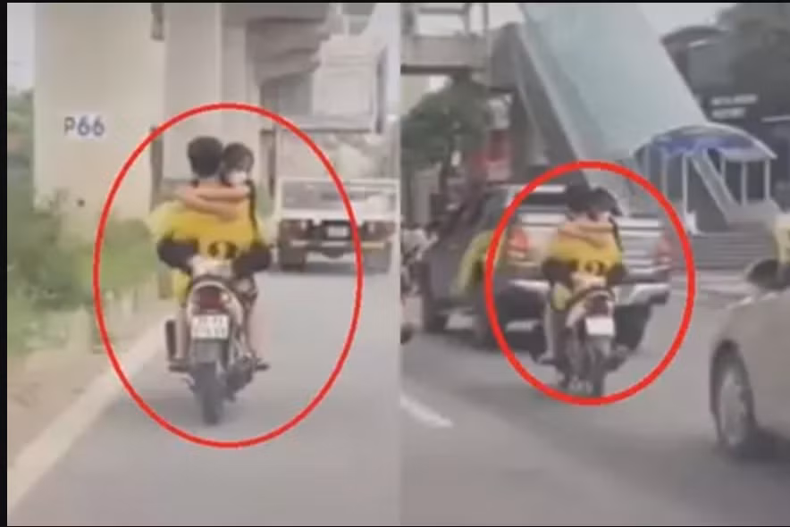Hai người đi với tốc độ khá cao, lạng lách trên đường. Đặc biệt, họ còn bật xin nhan bên phải liên tục nhưng không rẽ gây ảnh hưởng đến việc tham gia giao thông của những người phía sau.