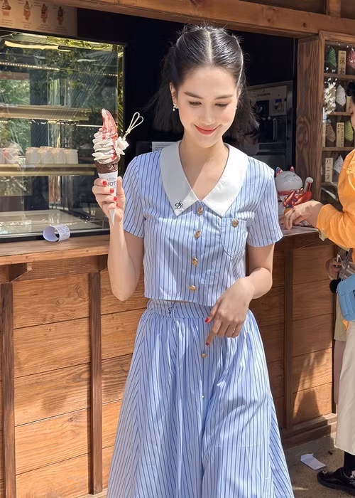 Chân dài gốc Trà Vinh trẻ trung hơn khi để tóc ngắn.