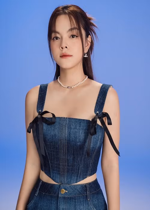Trái ngược với người mẫu Diệp Lâm Anh, không ít mỹ nhân Việt lại làm bạn với chồng cũ. Phạm Quỳnh Anh là một trong số đó. Ảnh: FBNV.