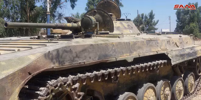 Trong diễn biến liên quan, ngày 18/7, Quân đội Syria đã giành lại quyền kiểm soát thêm một khu vực chiến lược khác ở phía bắc tỉnh Daraa, tiến quân về thành trì cuối cùng và quan trọng nhất của phiến quân trong khu vực này. Ảnh: SANA.