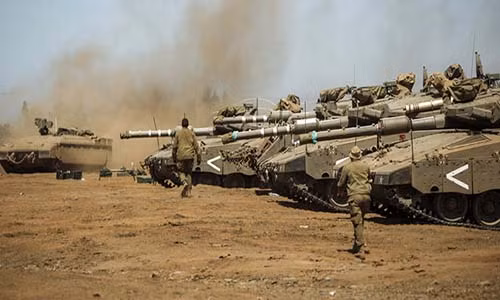Xe tăng của quân đội Israel gần Cao nguyên Golan. Ảnh: Hareetz