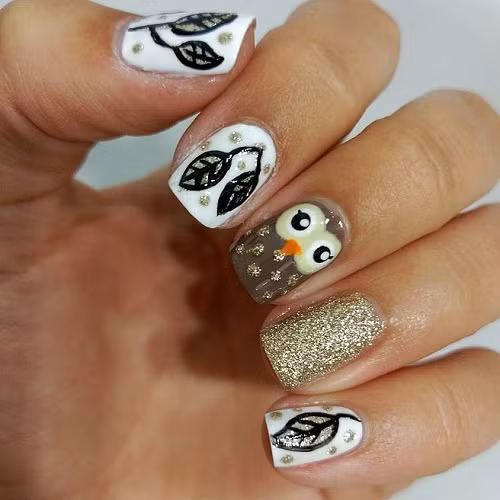 Nail hình con cú và chiếc lá cá tính.