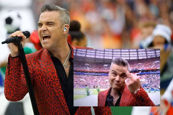 Hành động giơ "ngón tay thối" của Robbie Williams tại khai mạc World Cup 2018 bị dư luận chỉ trích nặng nề.