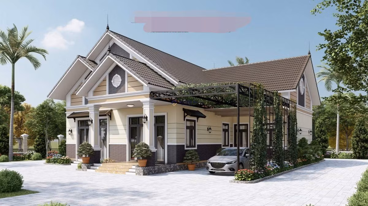 Nhà cấp 4 có sân vườn và gara ô tô với thiết kế vô cùng đẹp mắt, dành cho những gia chủ muốn tránh cuộc sống khói bụi thành phố. Ảnh: Âu Việt FS
