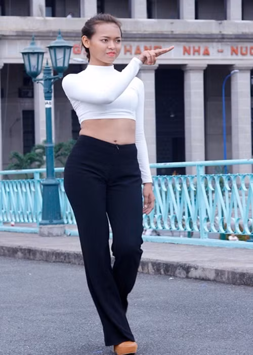 Vóc dáng của Mai Ngô không thực sự săn chắc ở Vietnam’s Next Top Model 2013. Ảnh: Khám Phá.