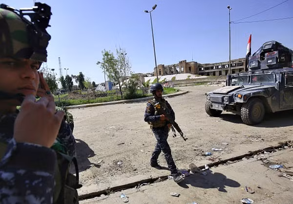 Hồi đầu tuần, lực lượng cảnh sát Iraq bắt đầu ập vào khu thành cổ sau nhiều tuần vây hãm. Ảnh: FNA.