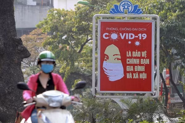 Bao My giai ma ly do Viet Nam it nguoi nhiem COVID-19