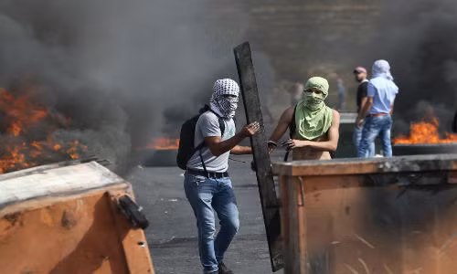 Khói đen bao trùm khu vực xảy ra đụng độ đẫm máu giữa Palestine - Israel ngày 12/10.